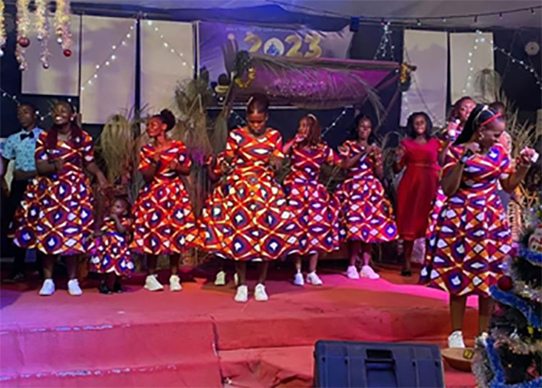 Children performing music, dance, and drama