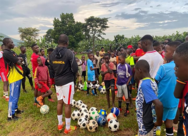 Children participating in holiday soccer outreach